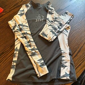 Xcel rash guard, Ocean Ramsey collection